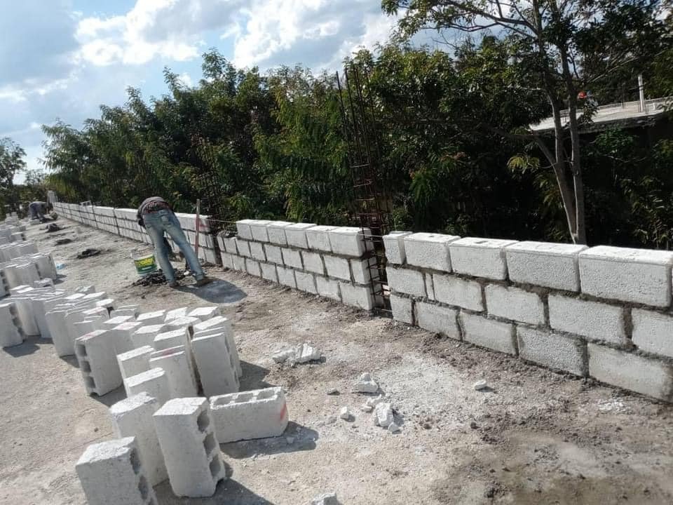 man building wall